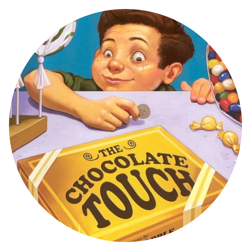 image of boy holding a coin and gazing at a box of chocolates that reads The Chocolate Touch