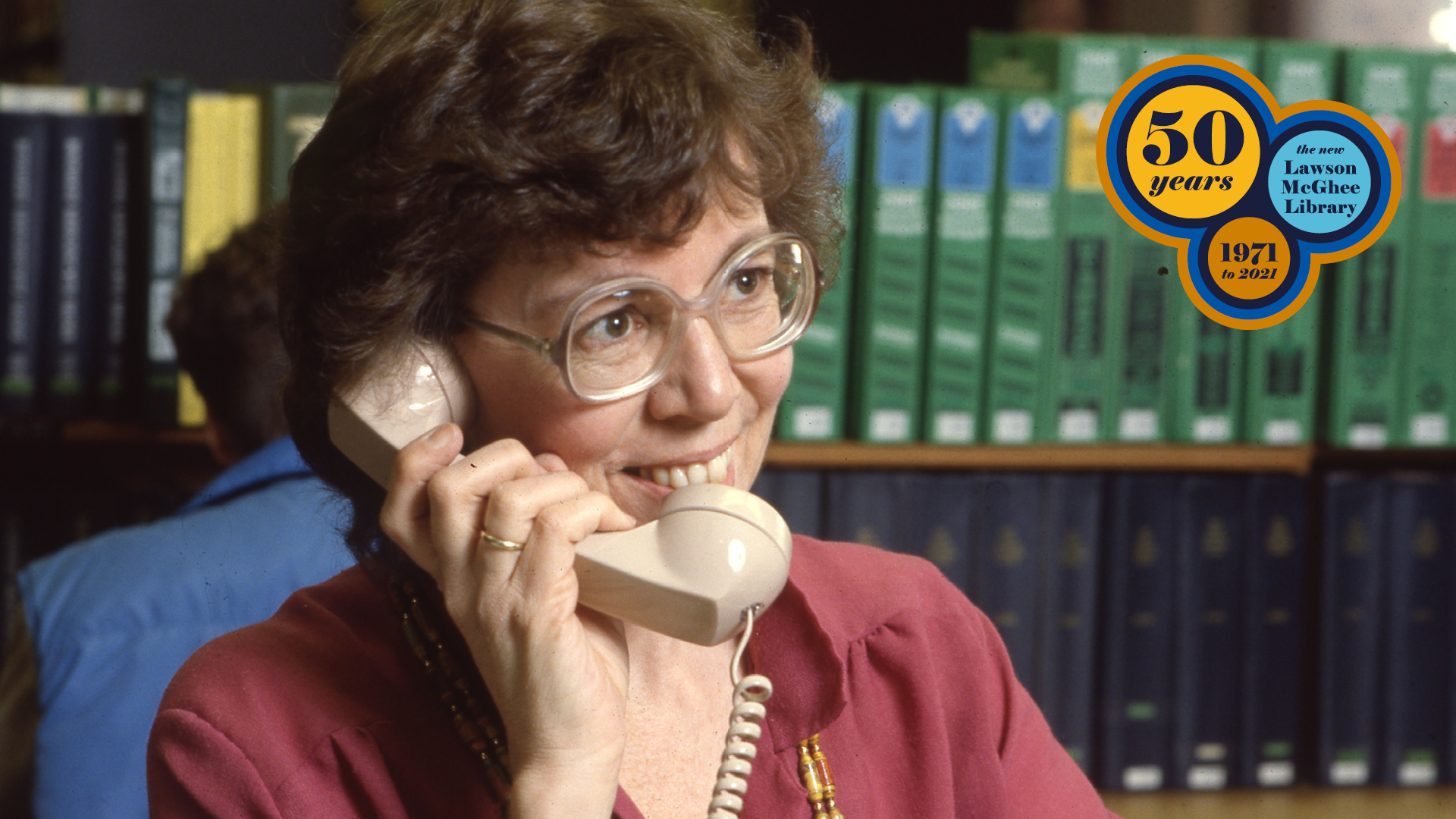 Woman making phone call in the Lawson McGhee Library.