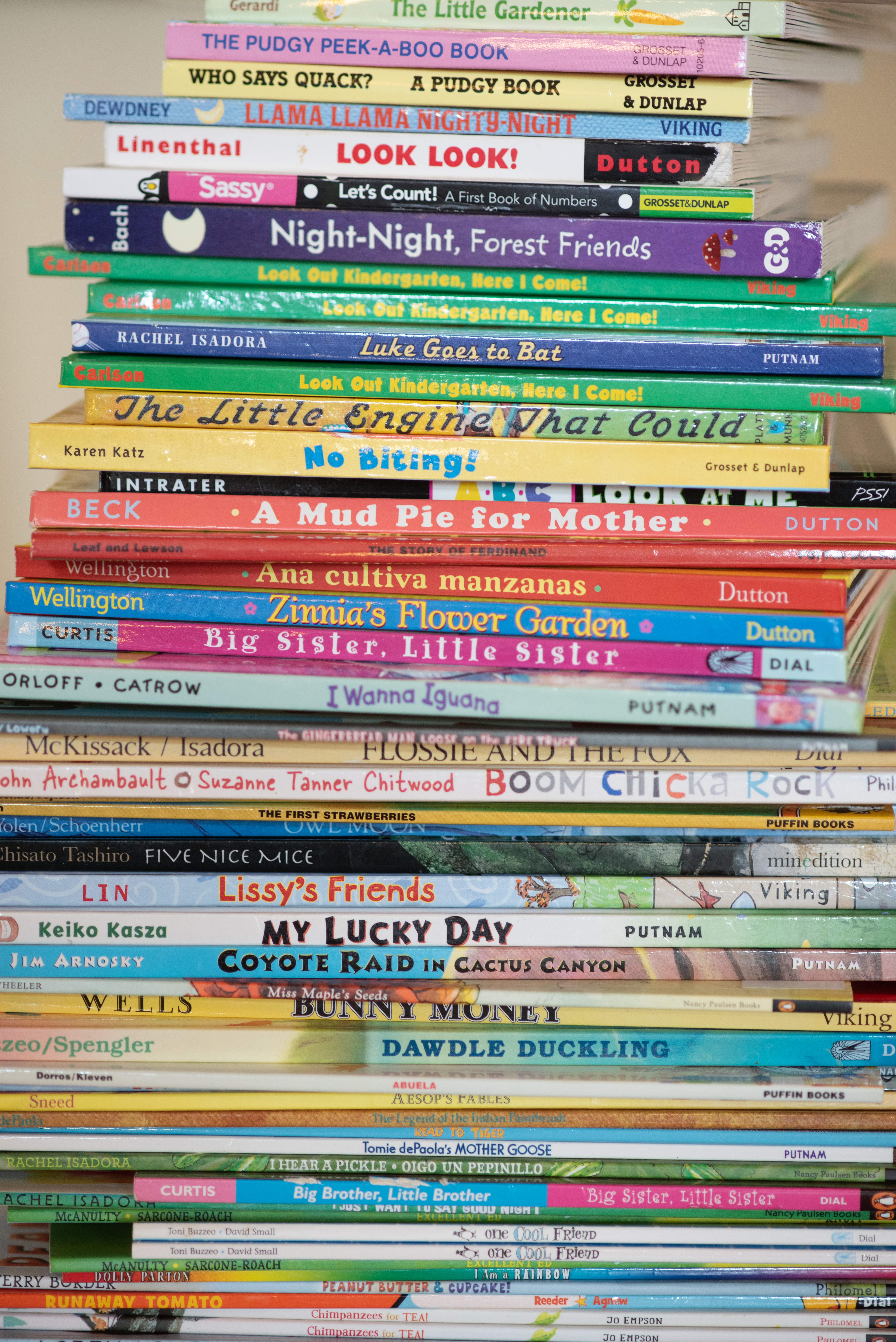 A stack of various children's books