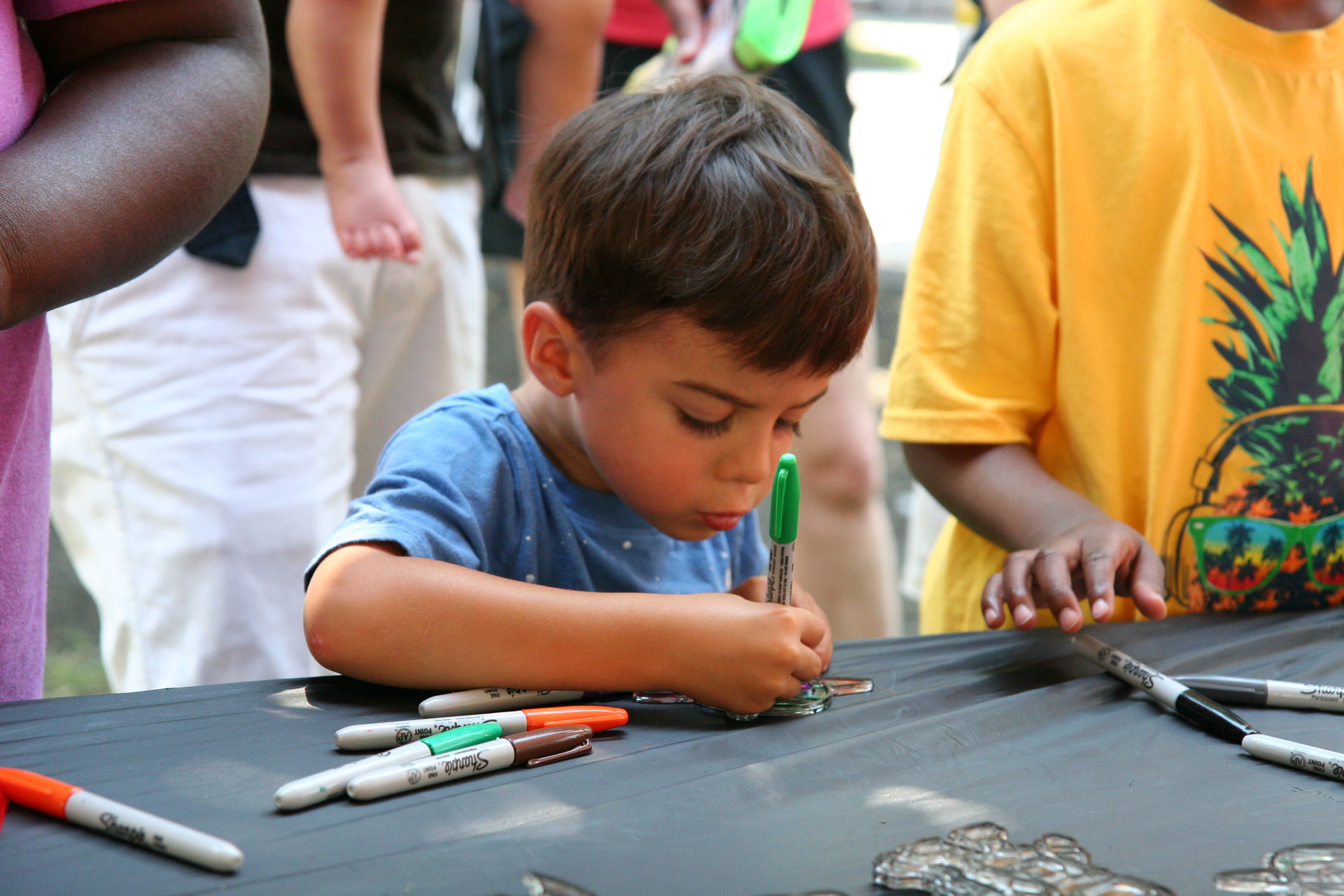 Young boy at the craft station