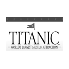 Black, gray, and white logo for the Titanic Museum Attraction reading "Titanic World's Largest Museum Attraction"