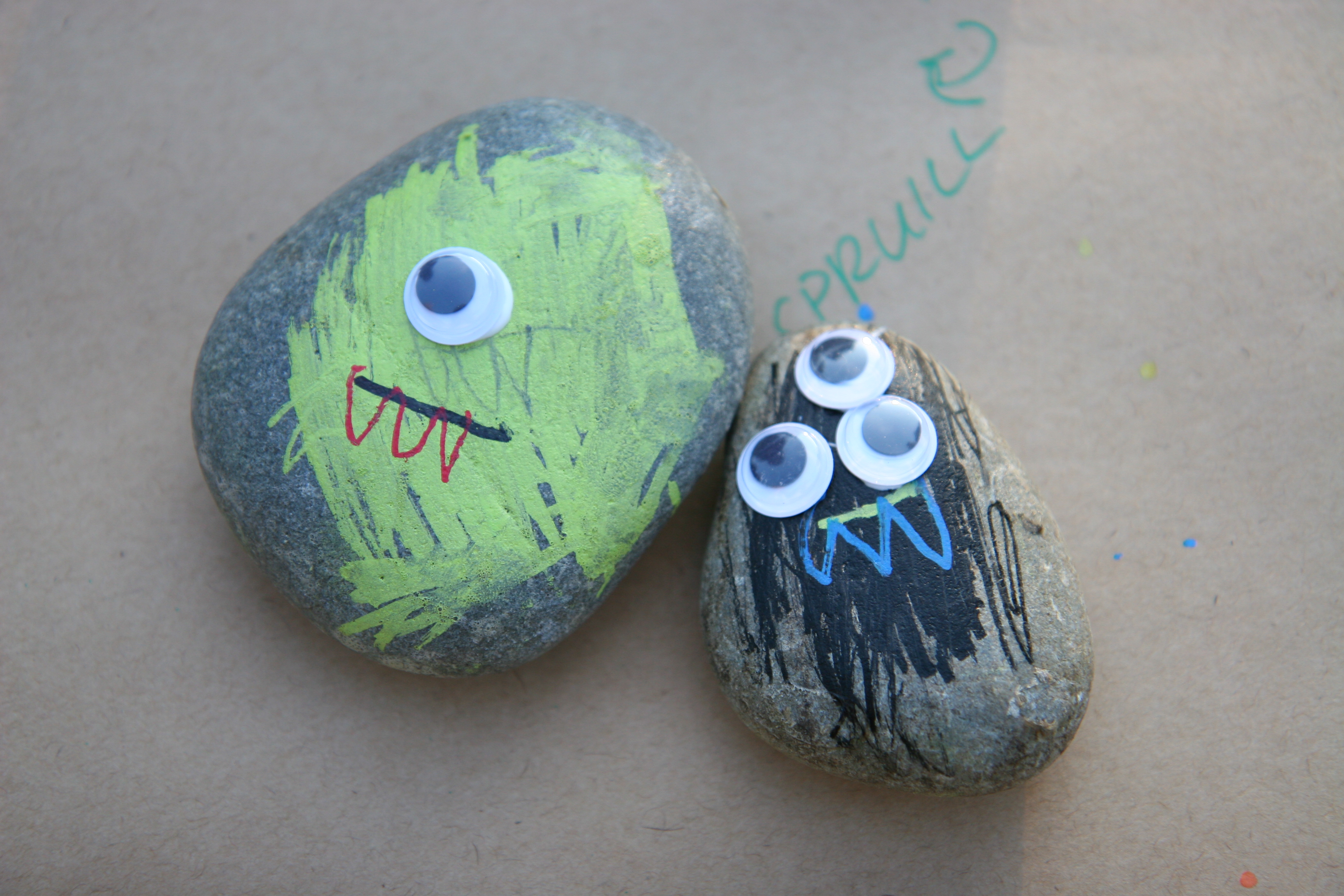monster painted rocks with googly eyes
