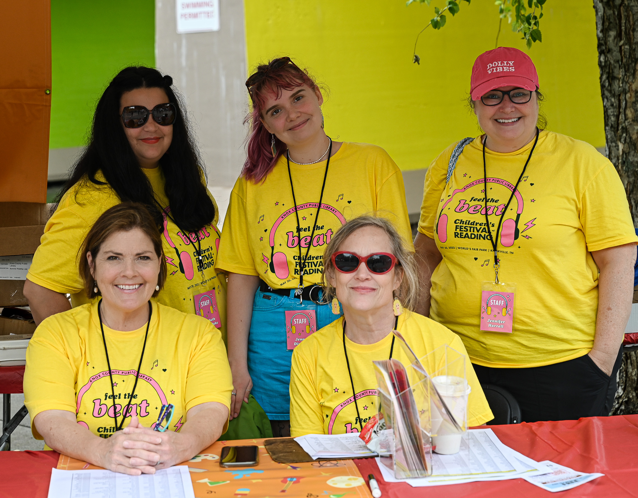photo of six women in yellow Children's Festival of Reading t-shirts