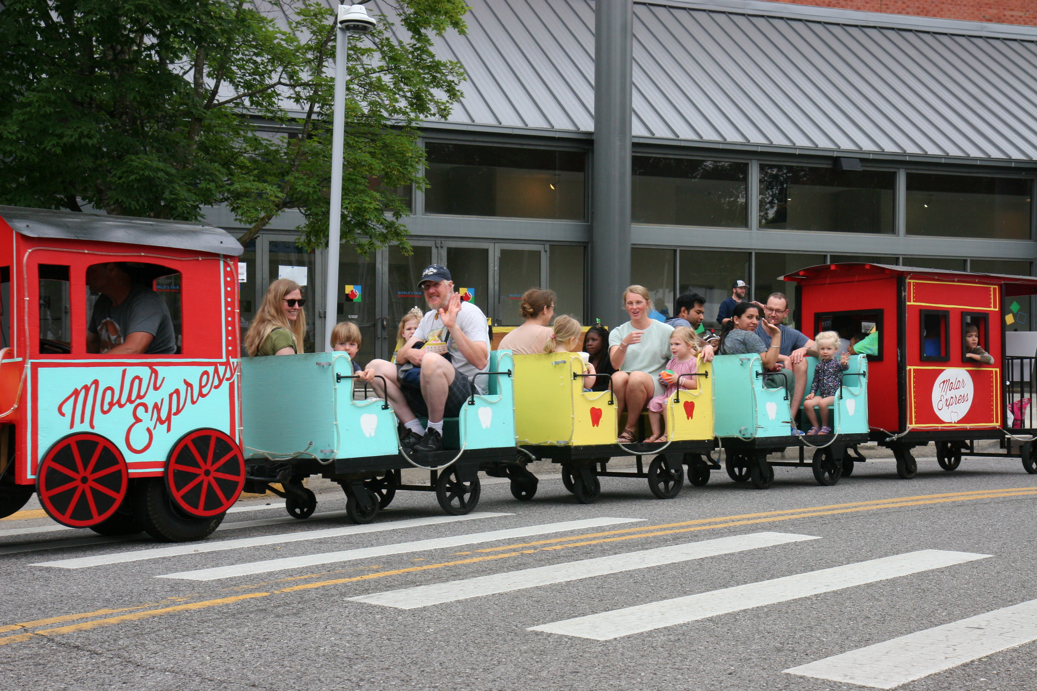 Picture of families riding small-scale train