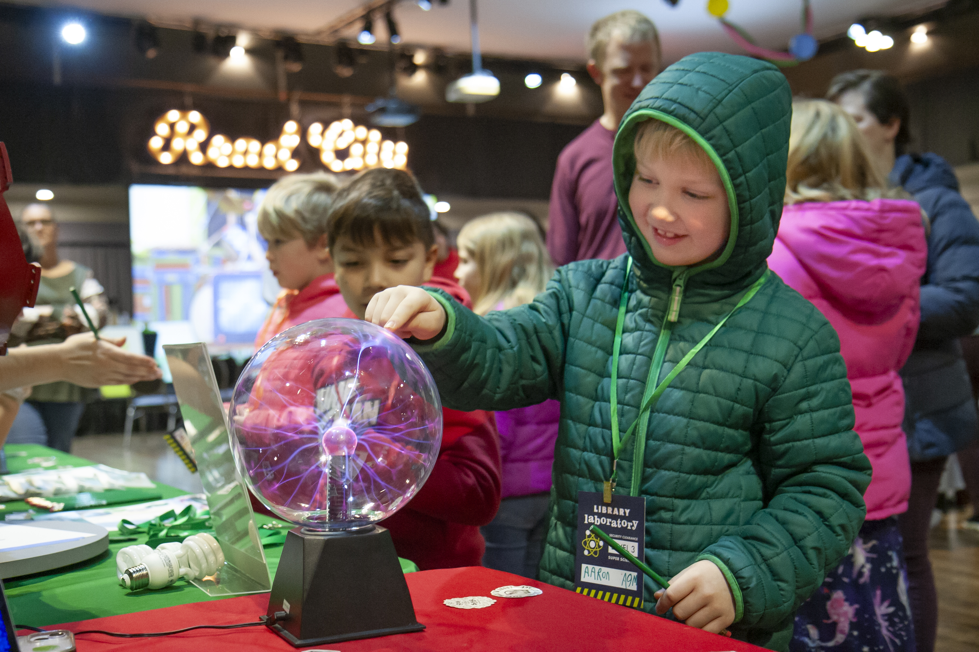 kid engaging with a science experiment