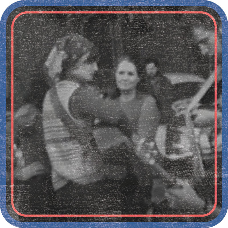 photo of Hazel Dickens on guitar with other musicians