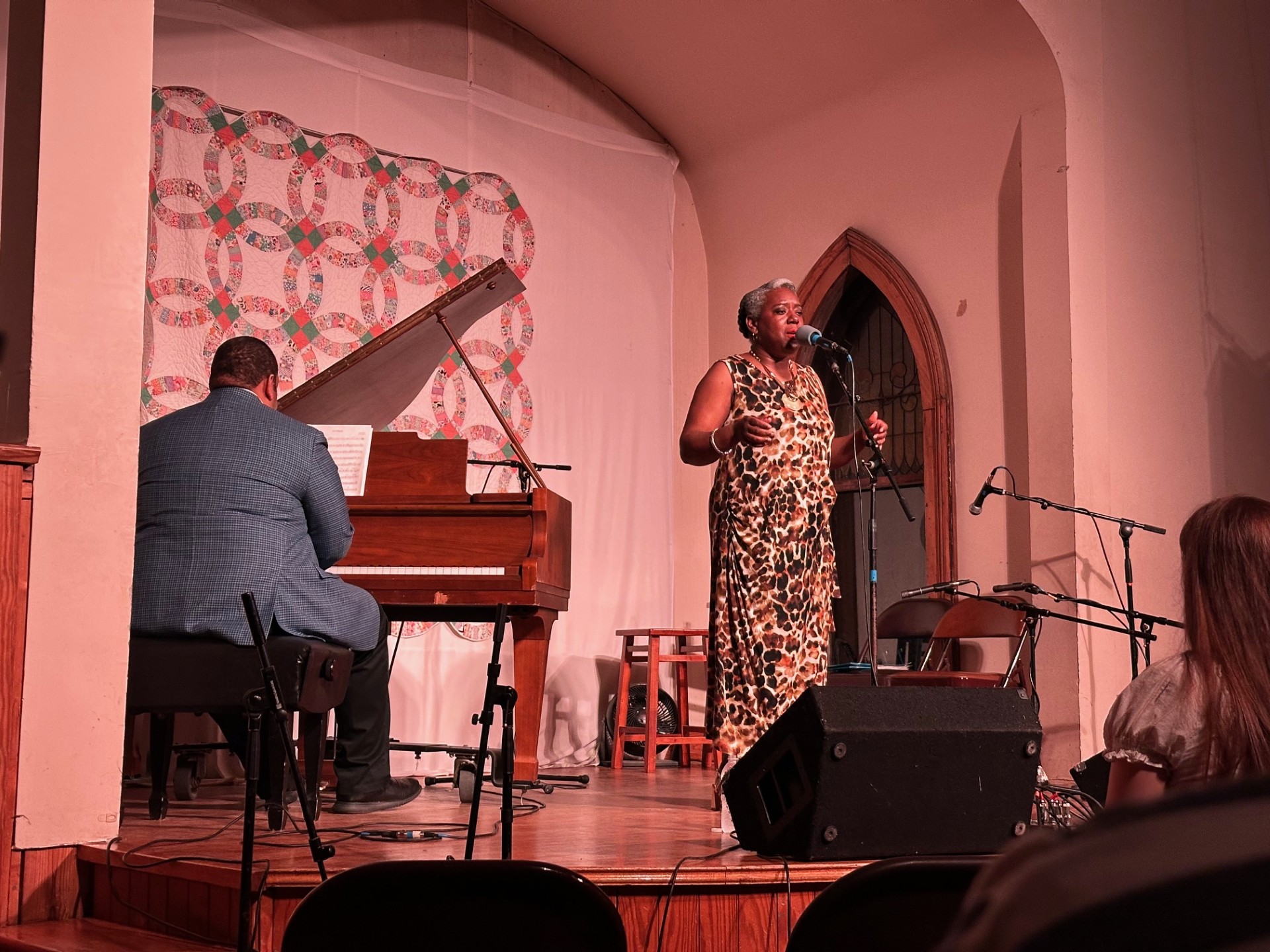 Kelle Jolly on stage at the Laurel Theater