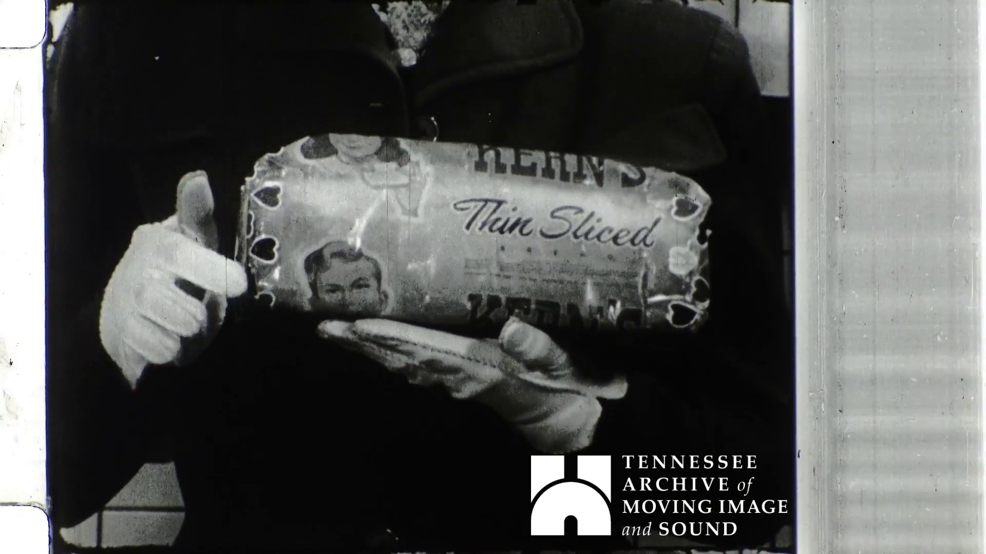 Person holding loaf of Kerns bread