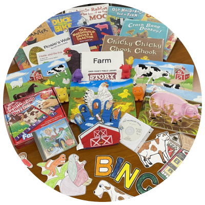 photo of books, finger puppets, cds, puzzles, and flannelboard elements