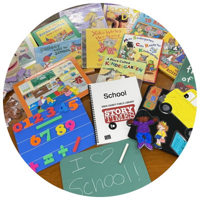 photo of books, flannelboard story elements, magnetic number board, puzzles, chalkboard and chalk