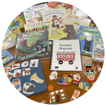 photo of books, games, and flannelboard elements