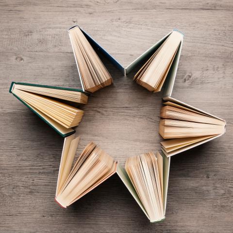 top view of books forming a star