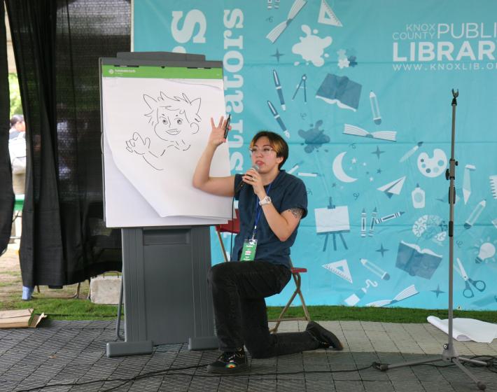 photo of author giving a presentation