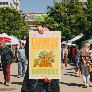 Farmers Market with Nourish Knoxville farmers market poster in the center